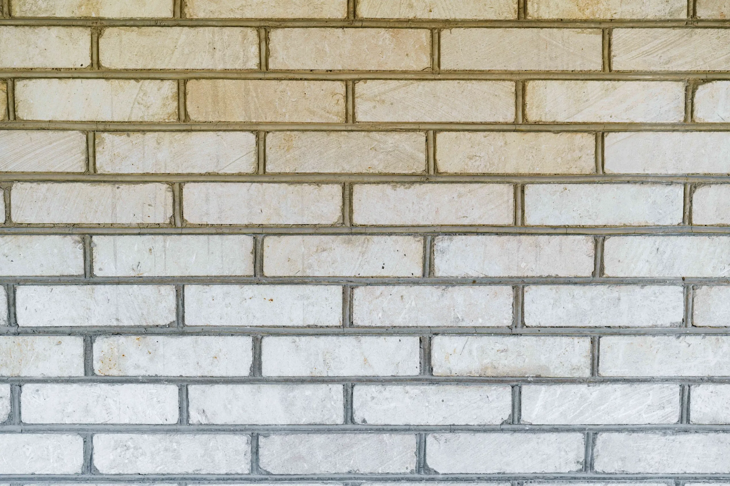 white-old-brick-wall-background-copy-space (1) pasang bata ringan